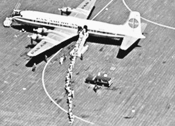 Aerial photo of American troops boarding Pan Am flight, Saigon