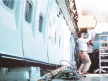 Pan Am employees Removing bins and compartments in preparation for CRAF modification (NARA photo)